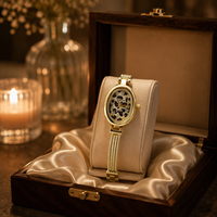 Montre à quartz élégante pour femme, design rétro exquis avec cadran ovale et chiffres romains, accompagnée d'un bracelet en acier allié PRO22