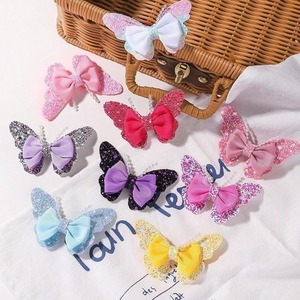 กิ๊บติดผมรูปผีเสื้อแฟชั่นน่ารักแบบใหม่ 2 ชิ้น สำหรับเด็ก ผ้าเนื้อนุ่ม ลายการ์ตูน เครื่องประดับผม - Product Image 1