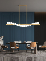 Lustre linéaire moderne en verre doré, suspension Magic Bean pour salle à manger, îlot de cuisine, décoration intérieure d'hôtel moderne