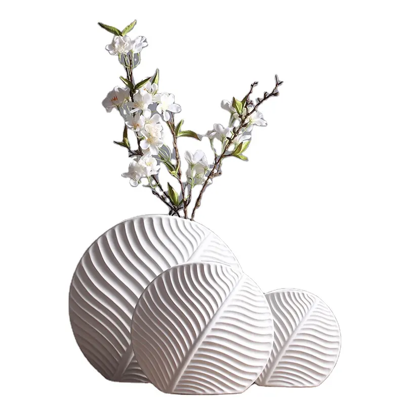 डेस्कटॉप सजावट के लिए नॉर्डिक सरल सिरेमिक लीफ फूलदान गृह सजावट अद्वितीय फूल कला चीनी मिट्टी के बरतन सजावट