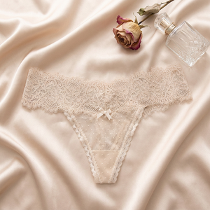 Tangas íntimas al por mayor para mujer, sexys, de malla con lunares, transparentes, de cintura baja, con encaje y lazo en la espalda. - Product Image 4