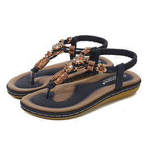 Sandales plates pour femmes à bout ouvert en faux daim avec décoration florale, semelle extérieure en caoutchouc respirant, tendance mode estivale, vente en gros - Product Image 4