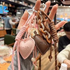 حقيبة صغيرة على شكل قلب مصنوعة يدويًا من الجلد والحبال، هدية عيد الحب للأزواج، سلسلة مفاتيح متعددة الوظائف - Product Image 1