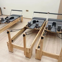 Equipo Profesional de Pilates Core Reformer de Madera de Caucho para Gimnasio, Venta al por Mayor Directa de Fábrica