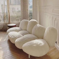 Canapé rose en peluche au design moderne pour chambre modèle Appartement une option de luxe léger avec des caractéristiques