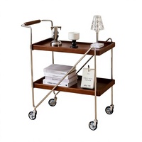 Table basse mobile minimaliste en bois massif avec chariot de rangement à roulettes, cadre métallique vintage, petite étagère d'appoint pour canapé, salon et salle à manger