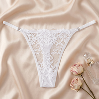 Culotte string en nylon tricoté blanc à dentelle florale pour femme, transparente, à fines bretelles, sexy, respirante, taille basse, vente en gros, OEM ODM