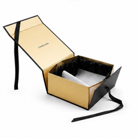 Boîte cadeau pliable rigide en carton avec couvercle rabattable et doublure en satin noir pour emballages de luxe et cosmétiques haut de gamme