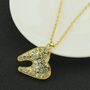 Pendentif en cristal de dent humaine, collier de dentiste, plaqué argent/or, bijoux médicaux, cadeau pour médecin/infirmière - Product Image 3