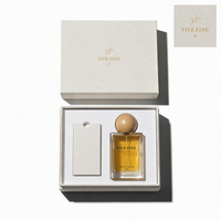 Boîte cadeau de luxe personnalisée avec logo rose en papier spécial, emballage de parfum bleu avec matériaux recyclés, gaufrage artisanal