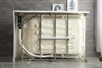 Baignoire carrée moderne en acrylique blanc avec hydromassage, installation en coin, accoudoirs et vidange central