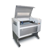Machine de découpe et gravure laser CO2 mini 4060/570 économique 400x600mm haute précision avec système d'eau Ruida CNC AI pour contreplaqué/bois/MDF/caoutchouc/pierre