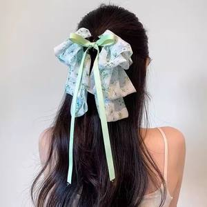 Pince à cheveux Super Féerique haut de gamme en forme de requin avec grand nœud floral en ruban, en acétate et tissu mousseline, pour queue de cheval, idéale pour les fêtes - Product Image 1