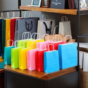 Wholesale Customized Printed Logo Recyclable Colored Kraft Paper Shopping Bags for Packaging and Gift Giving - Product Image 4
