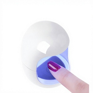 Lampe UV/LED compacte pour mini-manucure style influenceur, séchoir à doigt portable LED Q3 pour un seul doigt - Product Image 1