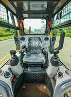 Mini-chargeuse frontale compacte avec attache de pelle rétrocaveuse XC7-SR07 avec une capacité de godet de 0,4 m³