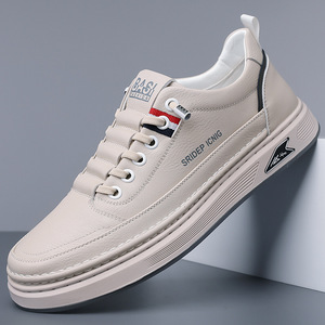 รองเท้าผ้าใบหนังสีขาวลำลองสำหรับผู้ชาย ส้นเตี้ย พื้นยางระบายอากาศ สไตล์สบายๆ สำหรับเดิน - Product Image 1
