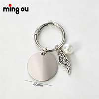 En stock, porte-clés rond en acier inoxydable de 30 mm avec aile d'ange et perle vierge pour gravure au laser, porte-clés en métal en gros