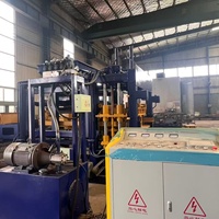 Machine industrielle QT7-15 pour la production automatique de blocs de béton, de briques creuses et de pavés