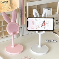 Support de téléphone portable en gros, support de bureau mignon en forme de lapin de dessin animé, support réglable pour smartphone et tablette