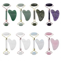 Masseur facial à double tête en quartz rose en forme de cœur, prêt pour l'exportation, ensemble domestique Gua Sha stimulant les fascias oculaires