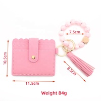 Ensemble de défense personnelle : Portefeuille porte-clés en cuir à pompon avec bracelet de poignet, perles en silicone, porte-cartes d'identité et de crédit pour femme
