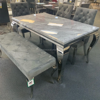 Ensemble de Salle à Manger 6 Places avec Plateau en Faux Marbre, Pieds en Acier Inoxydable et Base Argentée
