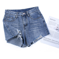 Short en jean vintage délavé personnalisé pour femme, taille haute, design déchiré et vieilli, bords irréguliers effilochés