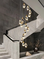 Lustre LED doré de style nordique moderne et luxueux, luminaire suspendu pour petite villa, duplex, escalier, restaurant, maison, avec longs cristaux
