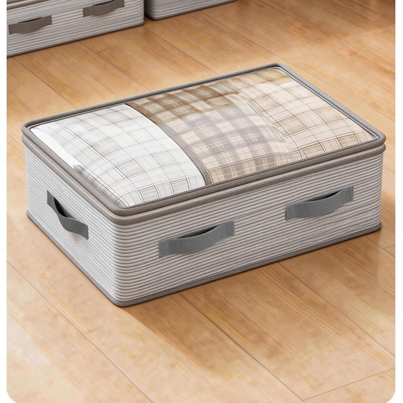 Striped comforter bag under the bed