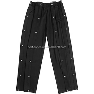 กางเกงบาสเก็ตบอลแบบสวมใส่สบายสำหรับผู้ชายและผู้หญิงหลังผ่าตัด ผลิตจากโพลีเอสเตอร์ทนทาน เหมาะสำหรับผู้สูงอายุและผู้ป่วย  แบบผ่าข้างสูง ติดกระดุมแป๊ก - Product Image 5