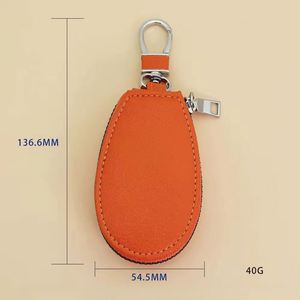 Nouvelle arrivée : Porte-clés en cuir grainé Litchi avec fermeture éclair pour hommes et femmes, organiseur de clés de voiture multifonctionnel - Product Image 6