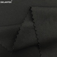 Tissu de verrouillage en polyester 100 noir Interlock respectueux de la peau pour échantillon gratuit de vêtement