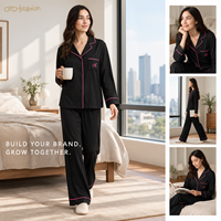 Ensemble deux pièces pour femme noir et rose avec passepoil, col cranté, manches longues, pantalon large, vêtements de détente, personnalisable OEM, vente en gros