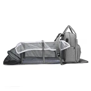 Sac à couches 7-en-1 sac à dos avec station à langer sac étanche de grande capacité avec lit de bébé pliable maternité momie sacs à couches