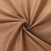 Tissu en taffetas de polyester 290T haute densité avec logo personnalisé en relief pour sacs de vêtements, tentes et doublures intérieures