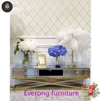 Table console de meubles miroir en acier inoxydable doré de haute qualité EV Guanding avec décor 3D table basse miroir mural