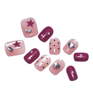 Lot de 10 faux ongles en acrylique pré-dessinés, forme amande, avec motifs œil de chat rose nude, étoiles, cœurs, pois et cristaux noirs - Product Image 4