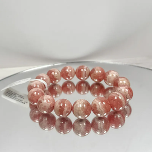 Pulsera de cristal de Rodocrosita Premium de 13mm con brillo de Rosa etérea y propiedades de atracción de amor - Product Image 1