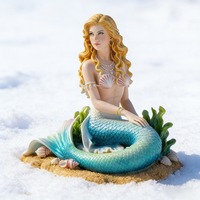 Sculpture de sirène en résine artistique, figurine de sirène assise sereine avec détails de coquillages et d'algues