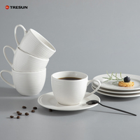 Vente en gros de vaisselle personnalisée de 200 ml, tasse à thé et à café blanche, tasse et soucoupe en céramique de porcelaine de luxe en relief