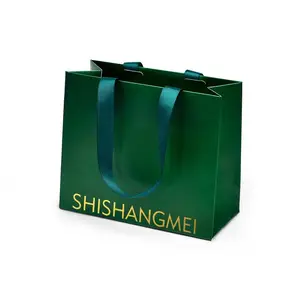 Şerit özel etiket geri dönüşümlü kozmetik kağıdı çanta ile sıcak satış lüks açık yeşil ambalaj çanta