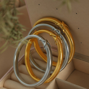European Style Crisscross Knot Titanium Steel <b>Bracelet</b> 18K Gold Plated Elastic Women's Jewelry Fashion Bangle - Product Image 1