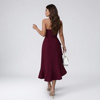 Robe midi évasée élégante unie pour femme, col licou, bretelles croisées, sans manches, en maille, à volants, ourlet asymétrique, fermetures éclair