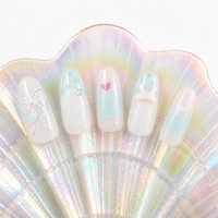 Ongles à presser forme cercueil style Balletcore doux et léger, bleu clair et rose nude avec nœud