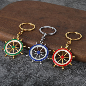 Accessoires <span class=keywords><strong>de</strong></span> style naval personnalisés OEM en alliage <span class=keywords><strong>de</strong></span> zinc, <span class=keywords><strong>ancre</strong></span> et gouvernail bleus et blancs, mousqueton pour volant, porte-clés, pendentif <span class=keywords><strong>de</strong></span> sac à dos - Product Image 1