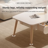 Table basse en bois blanc minimaliste nordique avec design de panneau décoratif et rangement de tiroirs pour salon