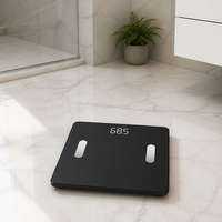 Balance connectée Bluetooth intelligente en verre trempé noir avec écran LED dissimulé pour suivi du poids corporel à domicile et en salle de sport