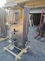 Machine d'emballage verticale électrique multifonctionnelle pour sachets de liquides en plastique / Ensacheuse automatique pour boissons, eau, lait, jus, miel