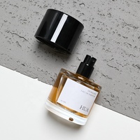 Nouvelle conception de flacon de parfum à bouchon à pression de 30 ml, 50 ml, 100 ml, flacon de parfum rond en verre avec bouchon noir